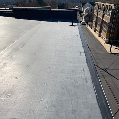 Completed New Commercial Flat Rubber Roof Installation